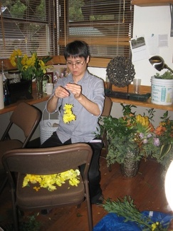 Preparing the flowers with great focus