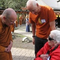 Luang Por visits with guests