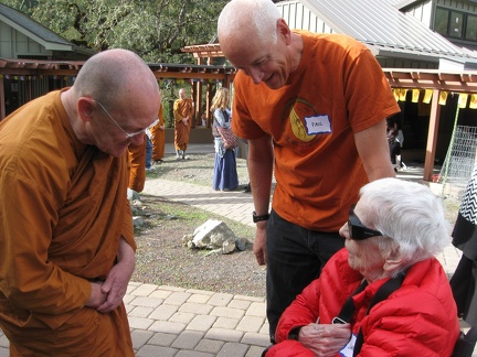 Luang Por visits with guests