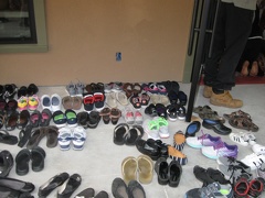 Some of the shoes of Kathina visitors outside the (new) hall