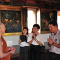 Luang Por talks with close lay-supporters at the Uposatha Hall of MahaCula University