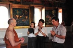 Luang Por talks with close lay-supporters at the Uposatha Hall of MahaCula University