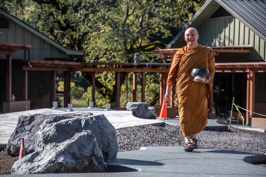 Luang Por Making his way through the new construction almost completed. 