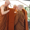 Tan Kondañño and Tan Jāgaro help the Sāmaṇeras with arranging their newly sewn robes
