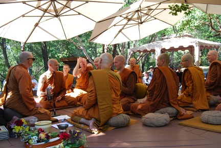 A moment of levity after Ajahn Ñaniko finishes chanting
