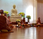 Luang Por Liem offers a teaching to the community