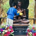 Preparing the Buddha Image for the evening's ceremony