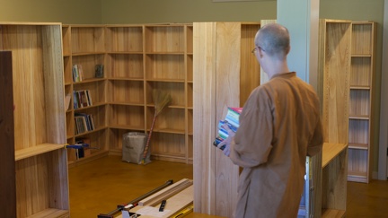 Tan Khantiko sorting books.