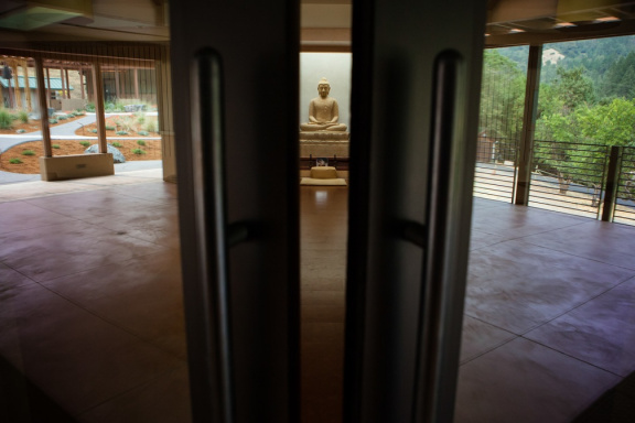 The sandstone Buddha image in the new meditation hall