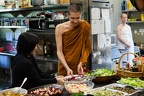 Monks receiving food for the meal