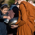 Offering alms to the monks