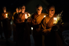 Ajahn Sek leads the monks as they circumambulate the Buddha on Māgha Pūjā.