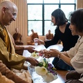 Senior monks receive lay guests.