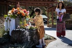Lay guests pay respect to the Buddha with a water bath.