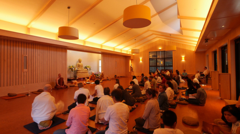 Gathering in the hall before meditation