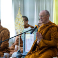 Luang Por chanting before giving a Dhamma talk at the Tawsi School