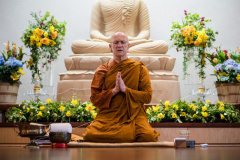 Luang Por Pasanno offers the three refuges and five precepts. 