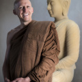 Ven. Dhammavaro poses with his triple robe set - the sabong at his waist, the jiworn across his upper body, the sanghati over his left shoulder. Multiple dyeings yielded a rich brown color distinct to madrone trees and thus unique among Buddhist monks.
